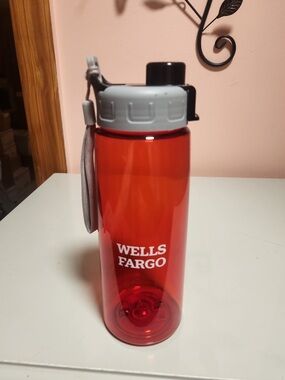 24 oz Reusable Plastic Water Bottle, Red Logo, Gray Screw-On Lid, Strap
